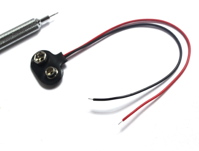 9V Battery Holder with Wire Leads, shown with mechanical pencil for scale.