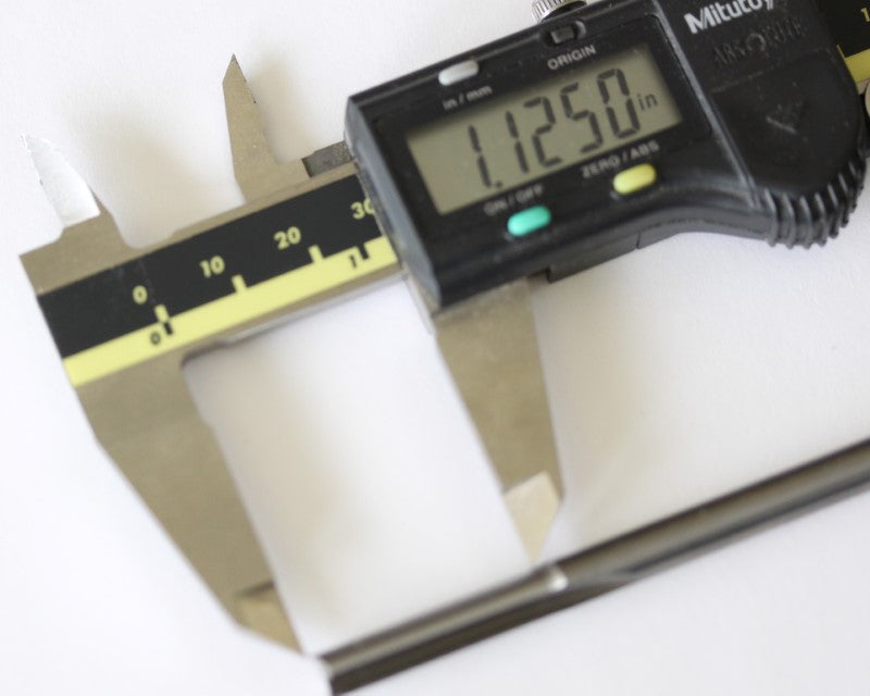 1/4" Straight V Flute End Mill shown with a caliper. The measurement reads 1.1250 inches (28.575 mm).