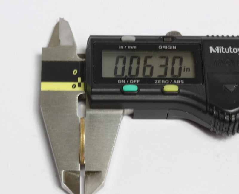 Measurement of the thickness of the 3/8inch Shim Washer