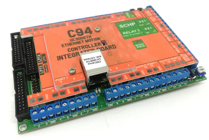 C94 UC300ETH multifunction CNC breakout board with the UC300ETH Ethernet motion controller installed, blue screw terminals and IDC26 expansion ports