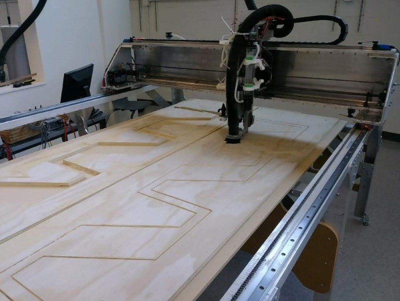 Fabricator Pro 5x10 metal CNC router cutting plywood