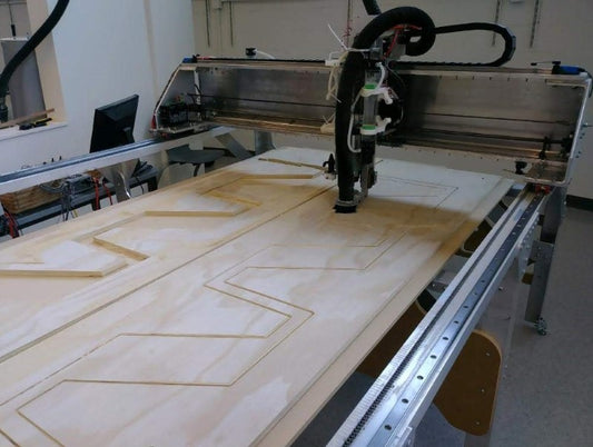 Fabricator Pro 5x10 metal CNC router cutting plywood