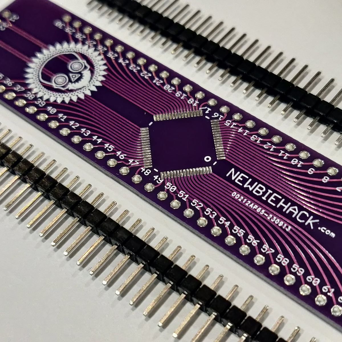 LQFP-64 breakout board with 3-sided breadboard adapter and header pins