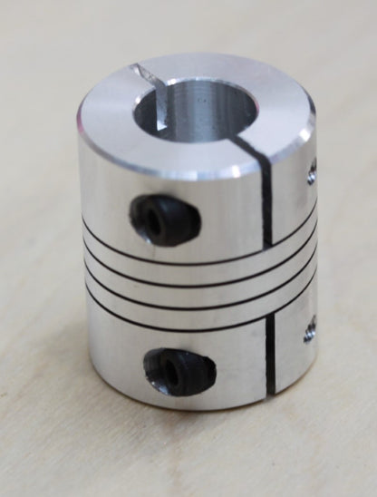 View of the 1/2" bore end of the 1/4" to 1/2" (12.7mm to 6.35mm) one piece flexible clamping coupling