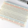 White solderless prototyping breadboard with 30 tie strips and dual power rails